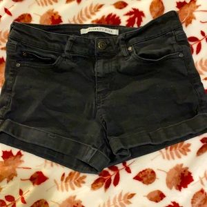 Black lightly used no rip demon shorts.